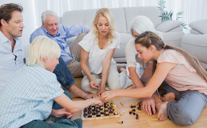 Family playing chess