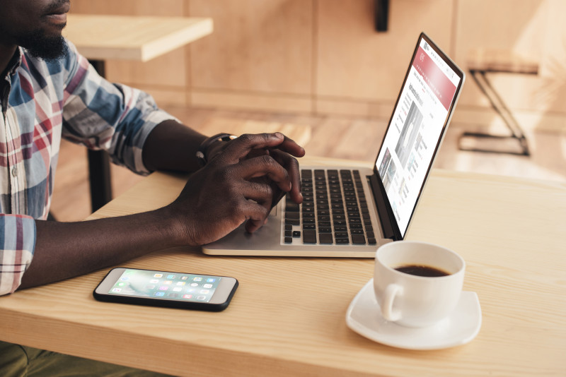 Man using computer with BBC