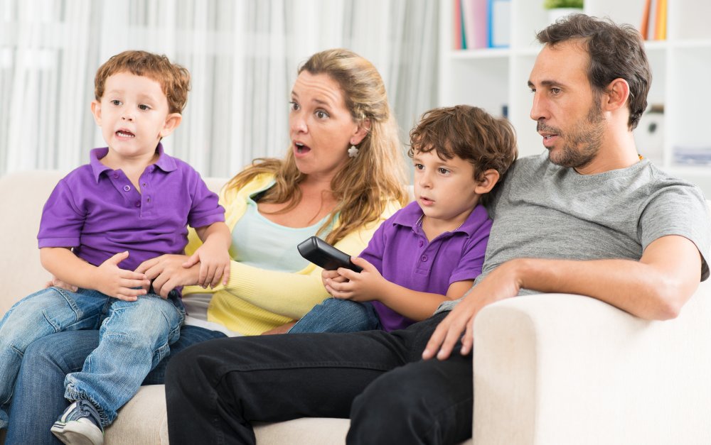 family watching tv surprised 1000