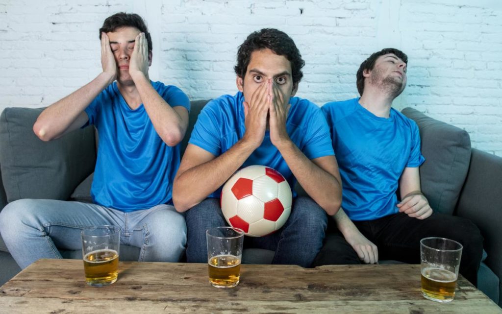 angry soccer fans watching tv 1200