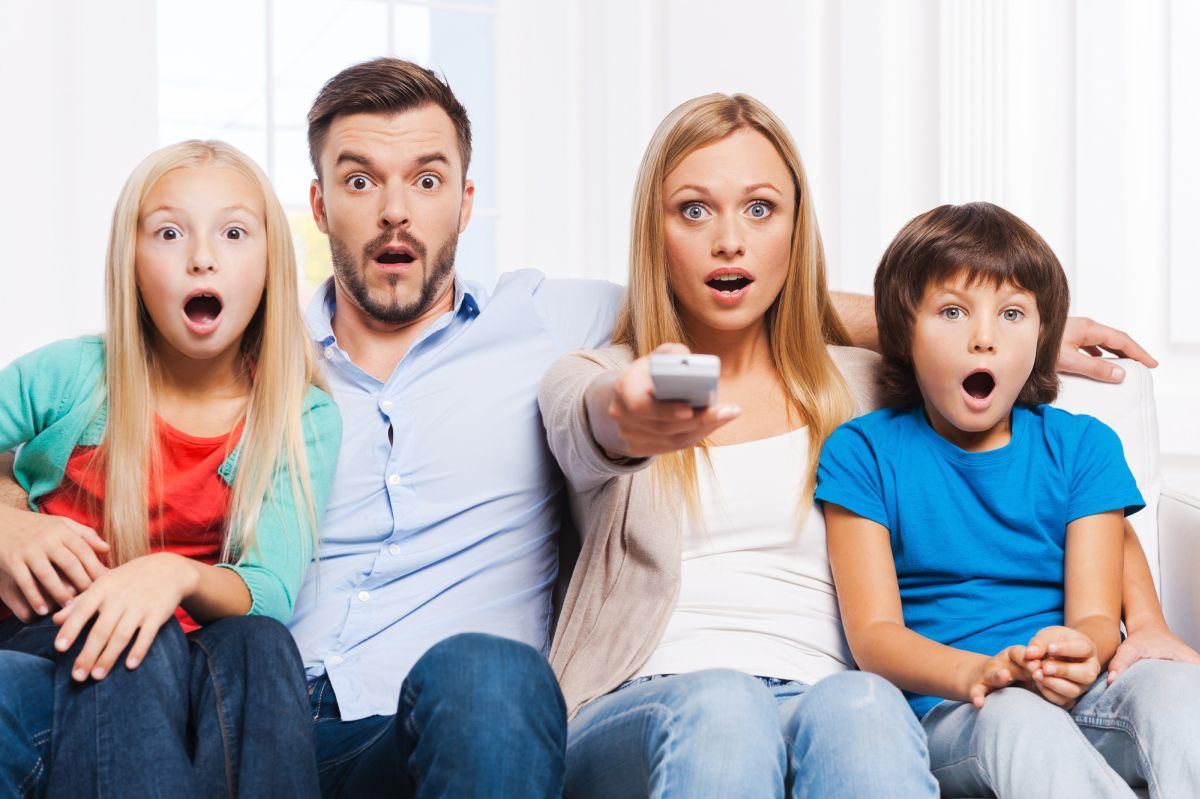 Family watching TV shocked surprised 120