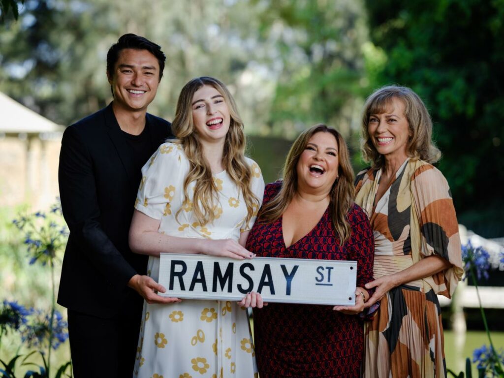 Neighbours cast with sign