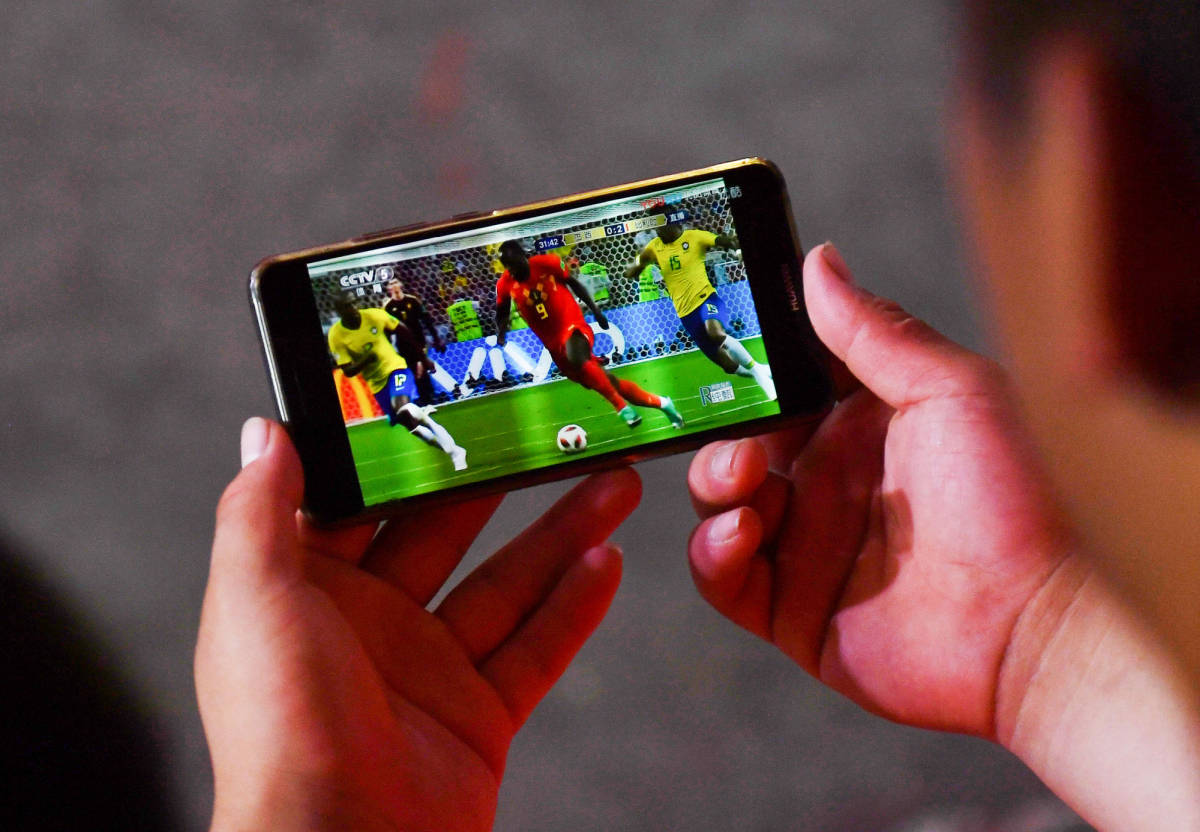 Watching football on smartphone phone