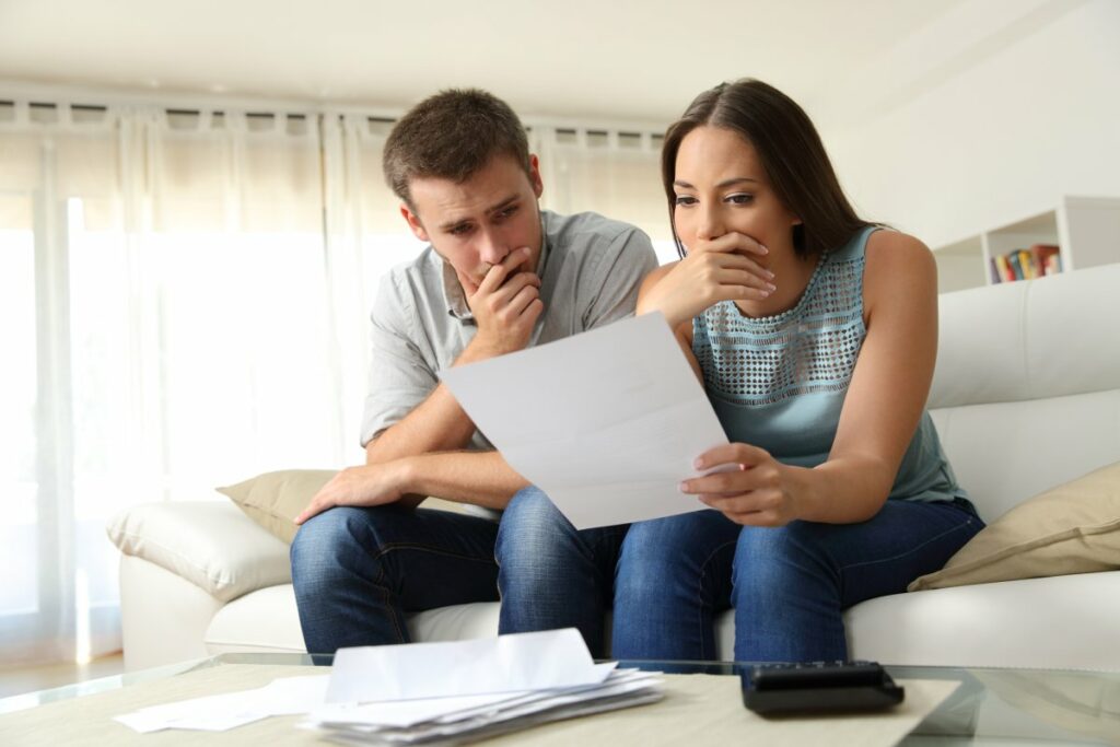 Couple reading scary letter