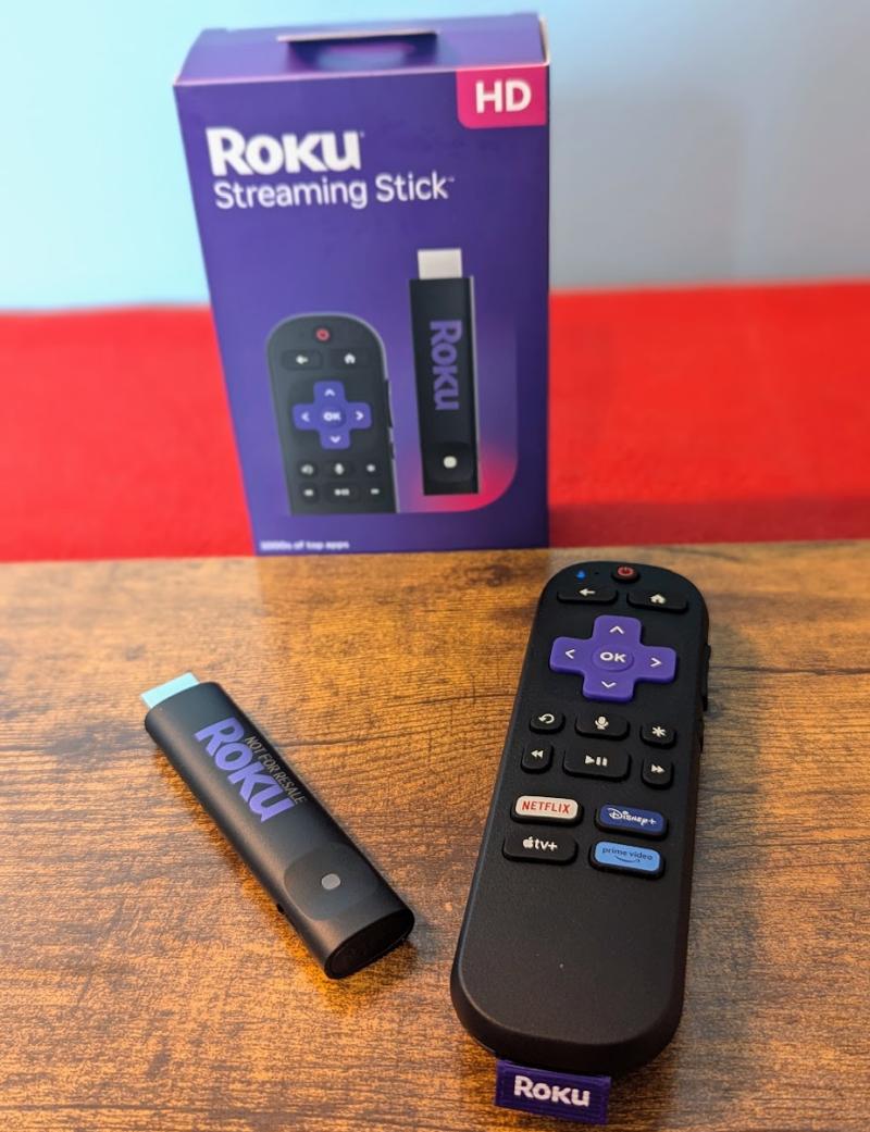 Roku Streaming Stick 2025 near box